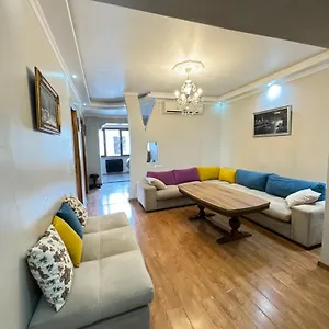 Апартаменты Warm Flat, Гонио